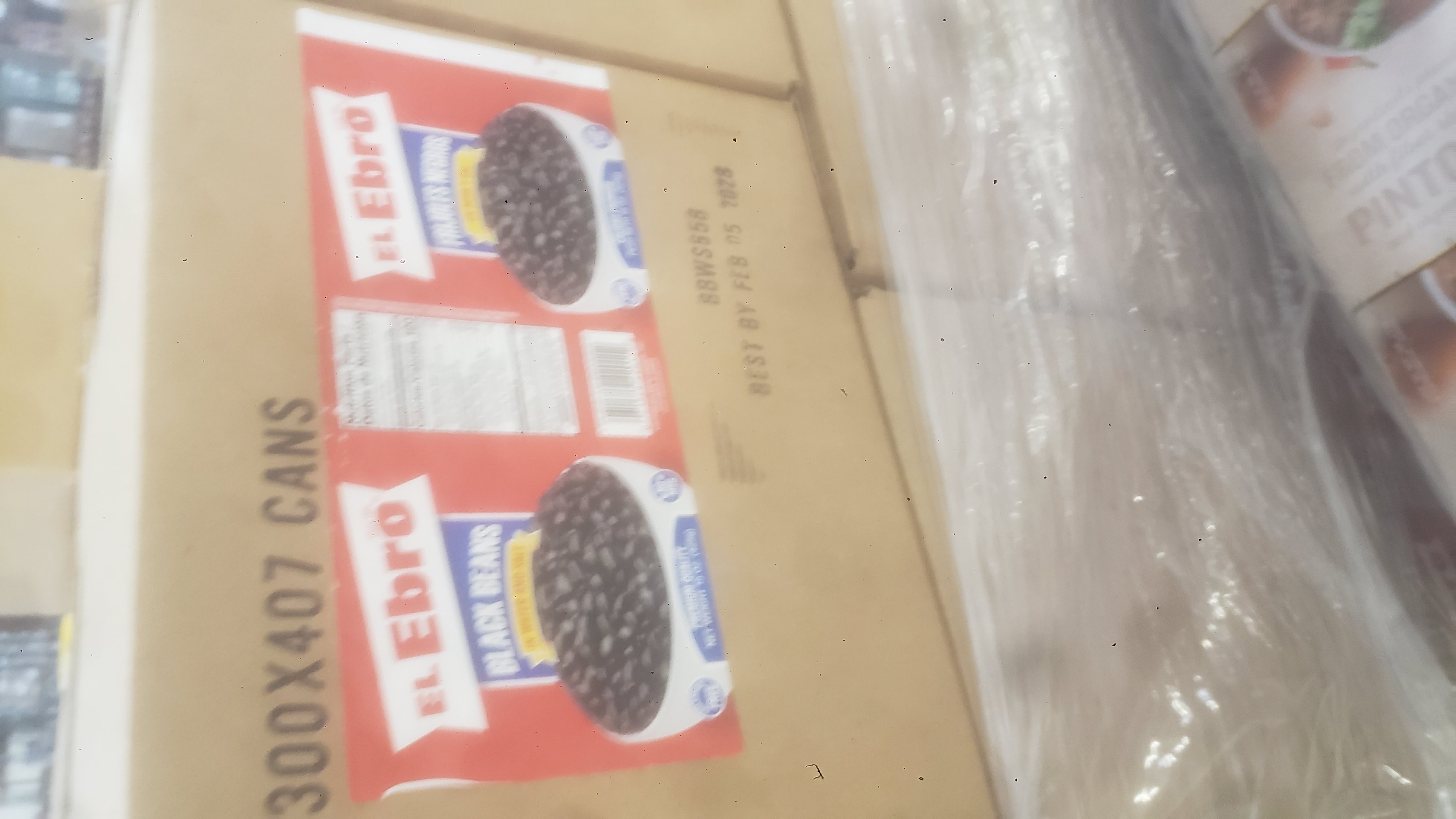 Boxes of canned black beans.
